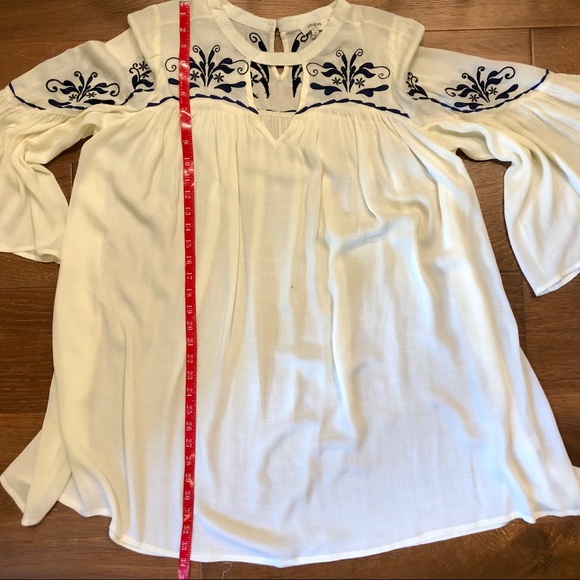 Flowy White Dress with Embroidered Detailing - Picture 12 of 13